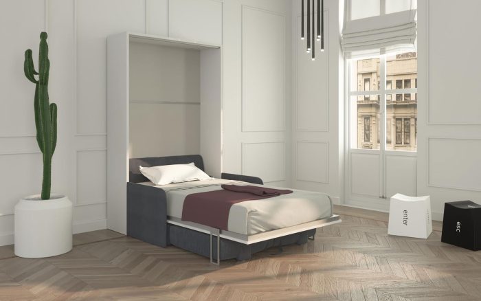 Il letto a scomparsa aperto in versione con divano contenitore